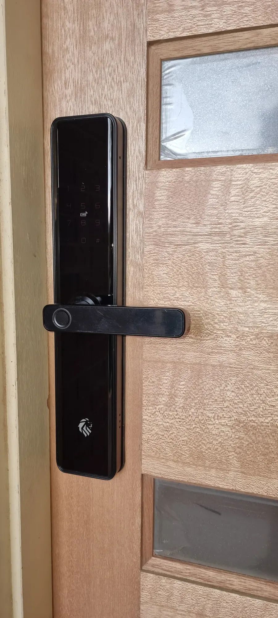 A black smart lock handle